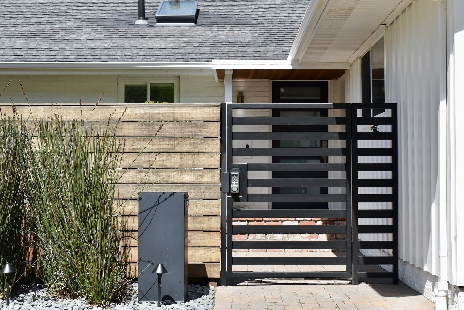 metal gate attached to house