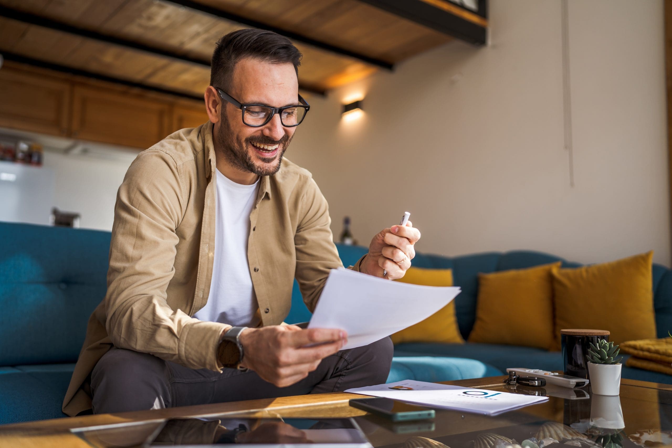 One,Man,Mature,Caucasian,Male,Work,At,Home,Hold,Paper