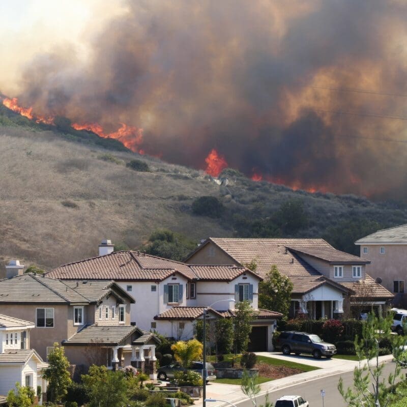 Southern California brush fire near houses