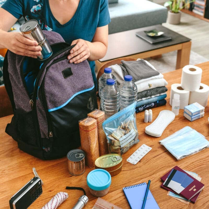 woman packing an evacuation bag