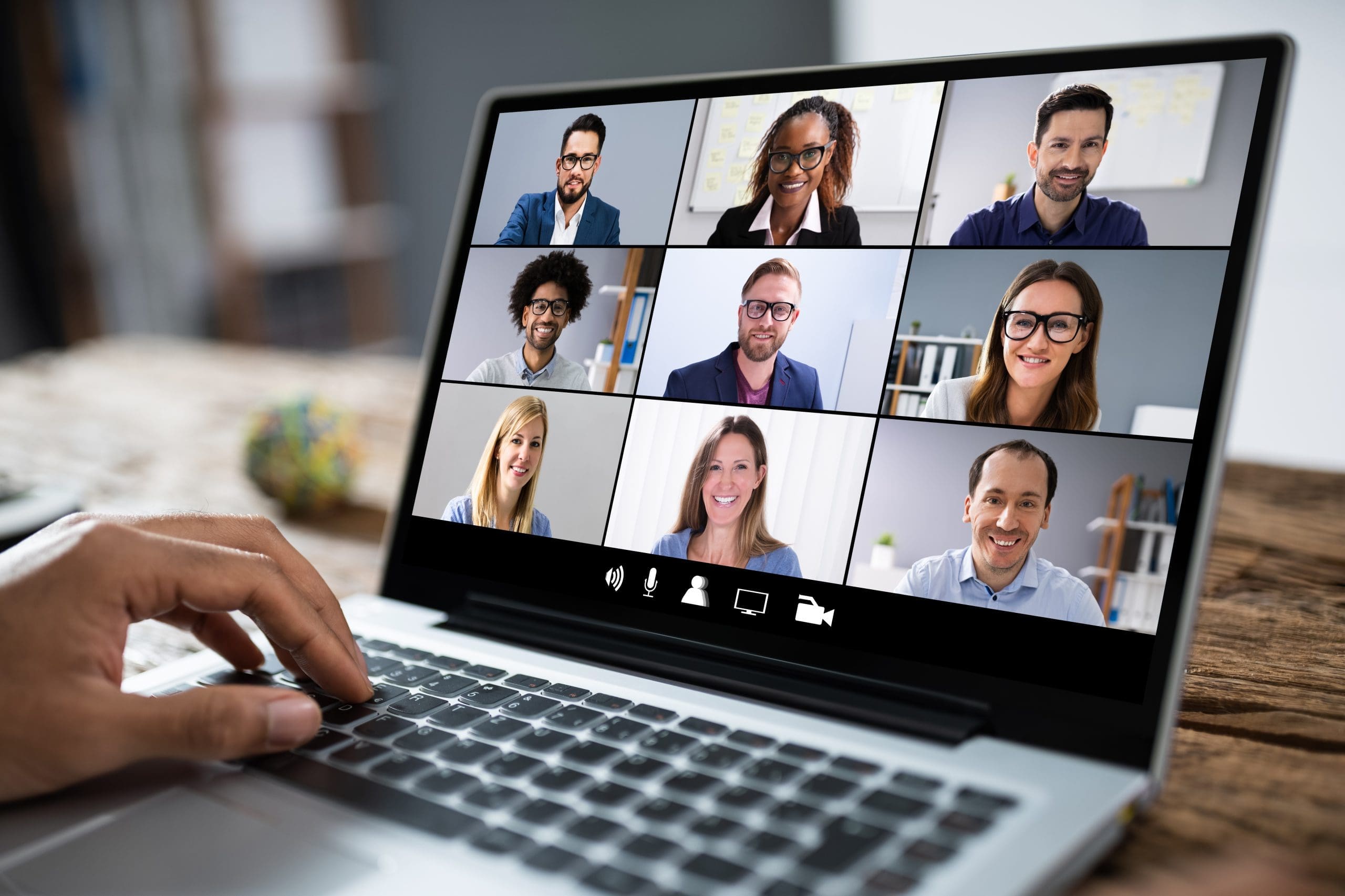 Man,Working,From,Home,Having,Online,Group,Videoconference,On,Laptop