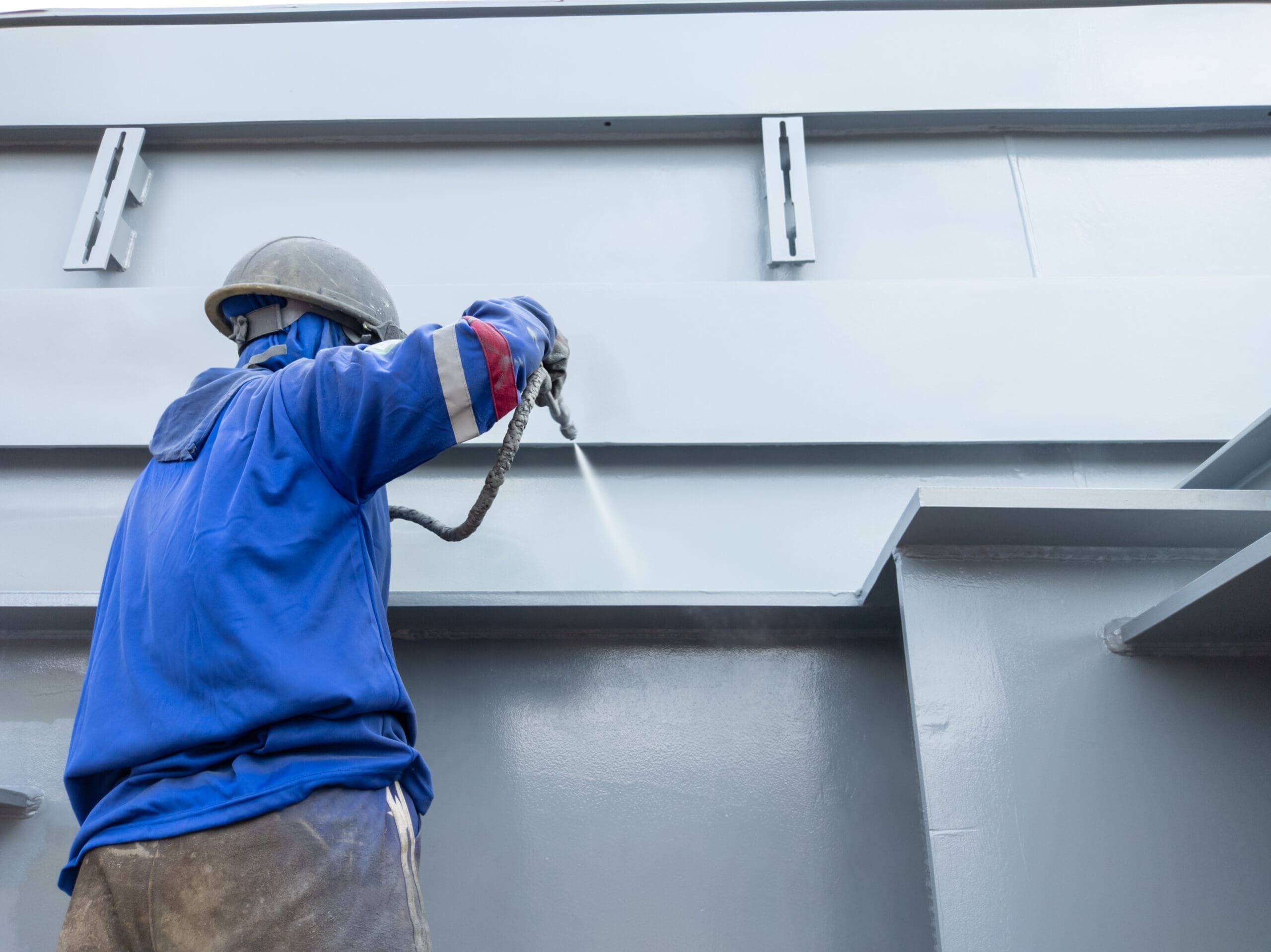 The,Painter,Is,Spraying,Top,Coat,Paint,To,Collect,The