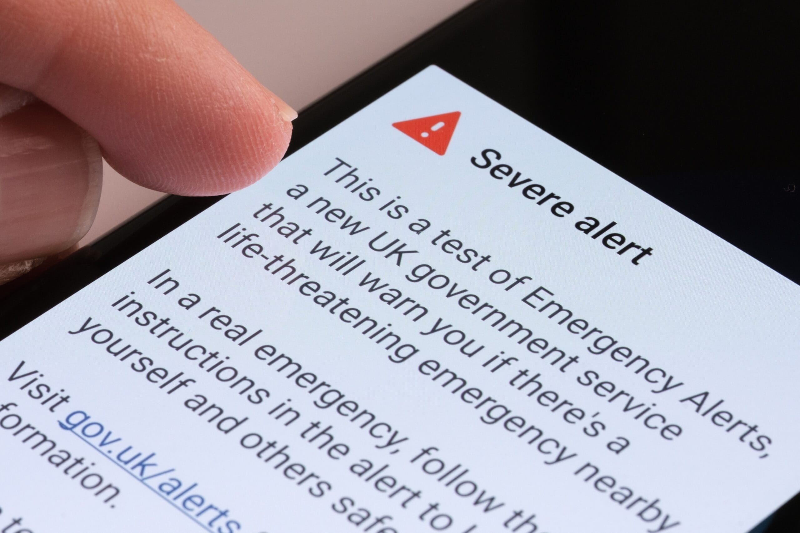 Finger,Pointing,At,Severe,Alert,Seen,On,The,Screen,Of