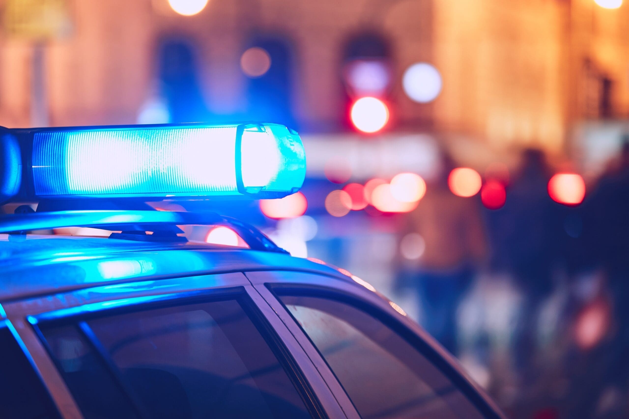 Danger,On,The,Street.,Blue,Flasher,On,The,Police,Car