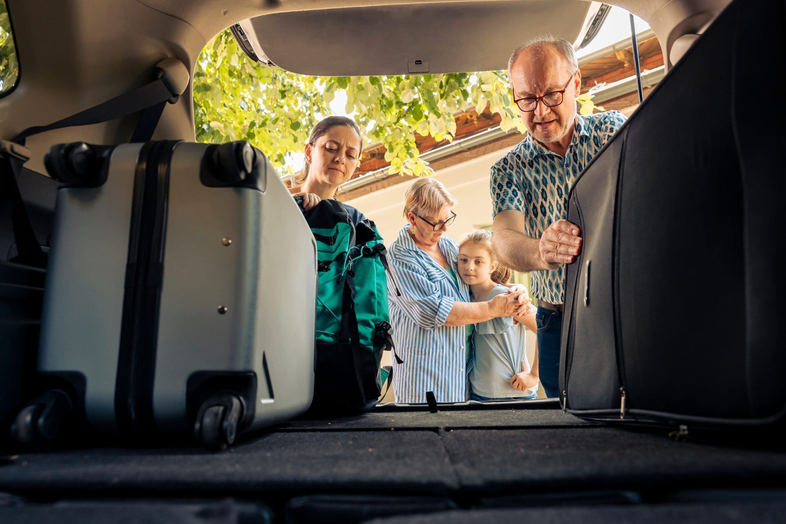 People,Loading,Suitcase,And,Luggage,In,Trunk,,Preparing,To,Travel